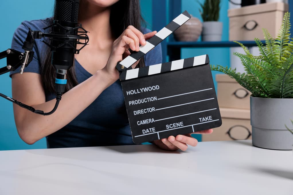 Film director holding a clapperboard